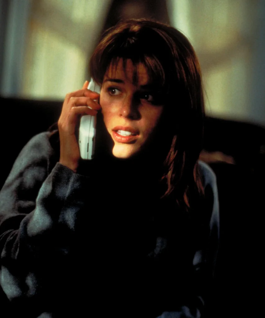 Neve Campbell como Sidney Prescott em Pânico 5